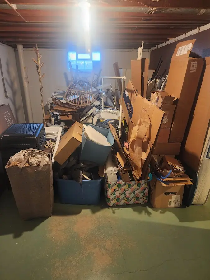 Roll-off dumpster container at job site for Yard Waste Dumpster Rental in Youngtown